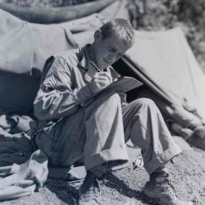 Soldier writing letter