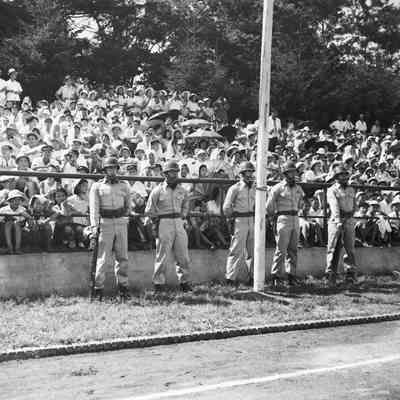 Soldiers standing in front of spectators at track ceremony