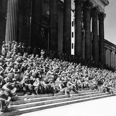 Soldiers sitting on steps