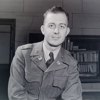 Portrait of Glen Caughan in an office