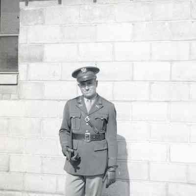Officer outside of barracks