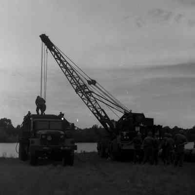 Soldiers training to construct a pontoon bridge
