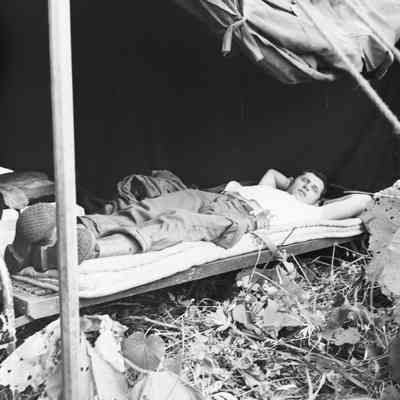 Soldier asleep in his tent