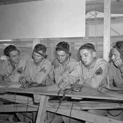 Soldiers learning Morse Code