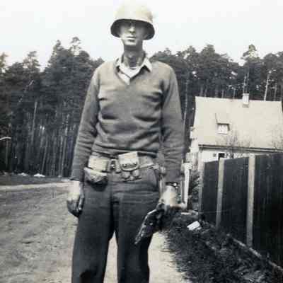 Officer standing on a rural road