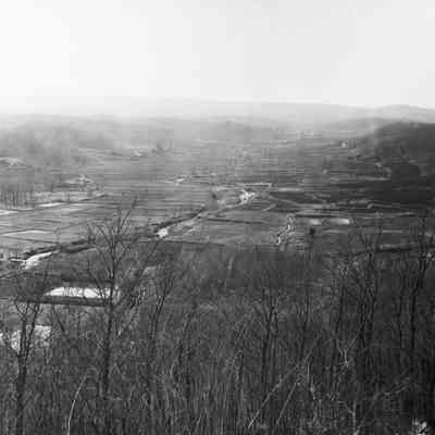 Scenic view of rural farm valley