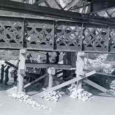 Soldiers reinforcing Bailey bridge