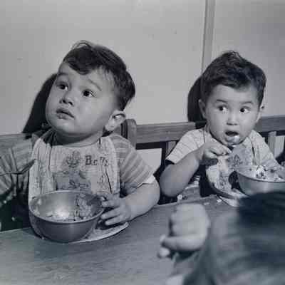 Japanese children in highchairs