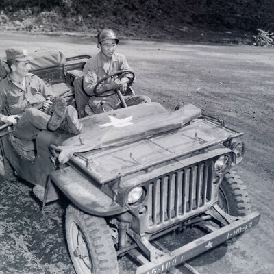 Two soldiers in Jeep
