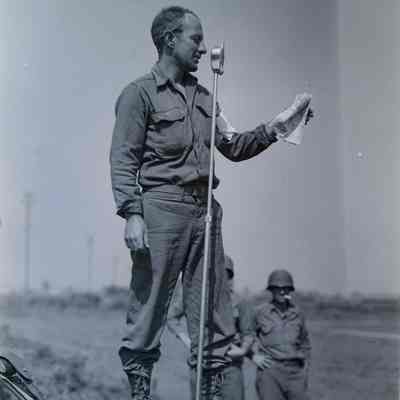 Soldier speaking at outdoor microphone
