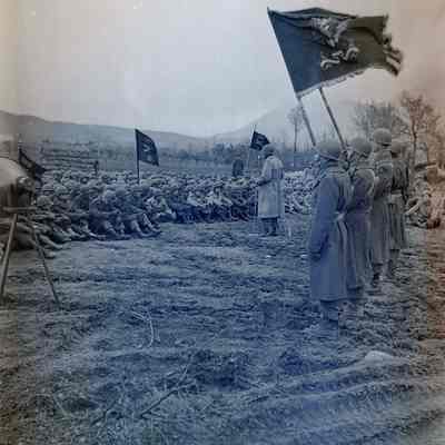 Soldiers sitting during ceremony
