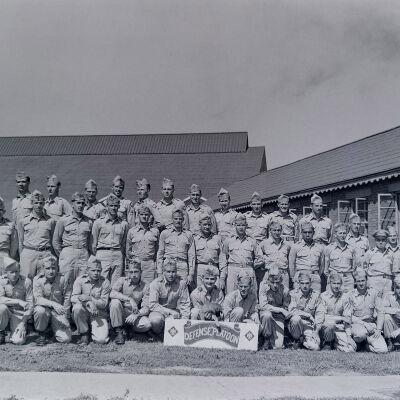 Defense Platoon photo in front of buildings