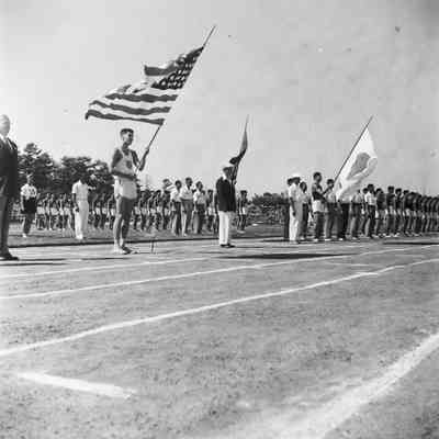 American and Japanese track athletes at ceremony