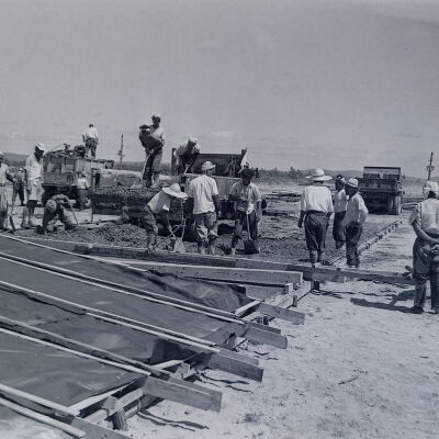 Japanese civilians pouring concrete on Army base