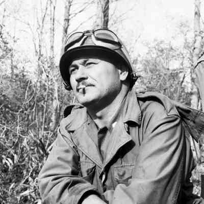 Soldier with cigarette looking into the distance