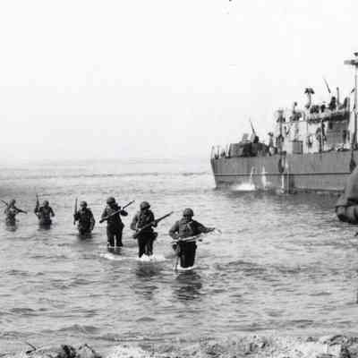 Soldiers wading ashore