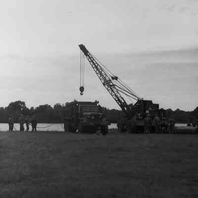 Soldiers training to construct a pontoon bridge