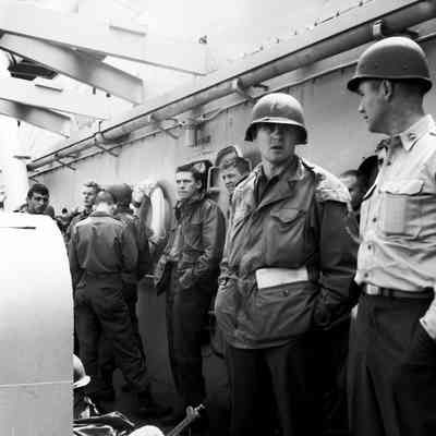 Soldiers waiting to disembark troop ship