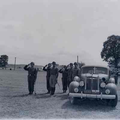 George Patton and other officers giving salute