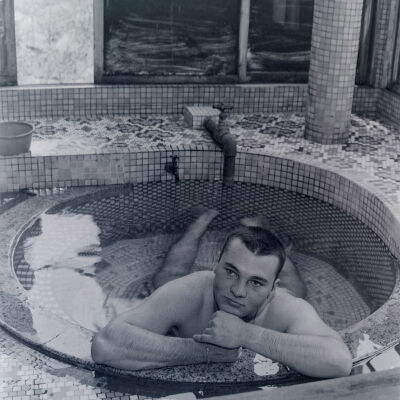 Soldier bathing in a tiled bath