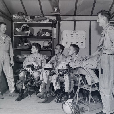 Air Force pilots suited-up in barracks