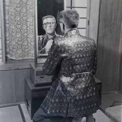 Soldier trying on a Japanese robe
