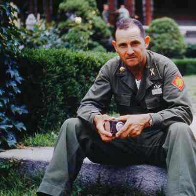 Soldier sitting with his camera