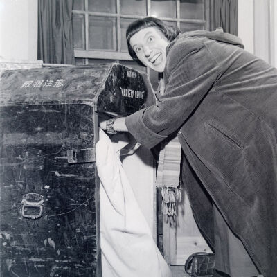 Female entertainer unpacking her trunk