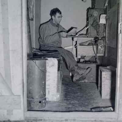 Soldier sitting in truck trailer