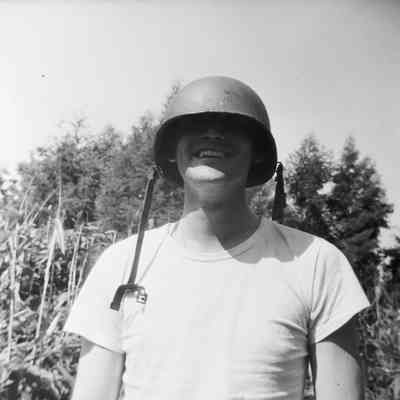 Soldier wearing his steel pot without liner