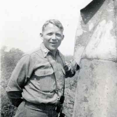 Officer posing with metal chunk