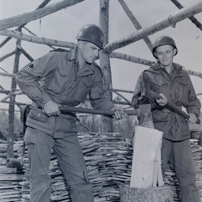 Soldiers chopping wood