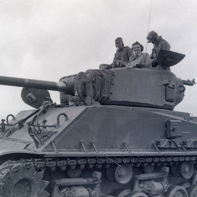 Women riding in a tank