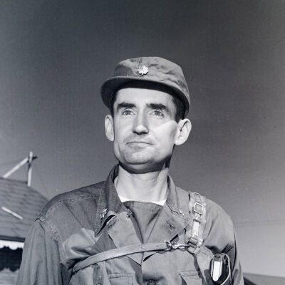 Portrait of Thurman Bouse wearing a shoulder holster