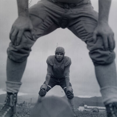 Looking between the legs of a football center