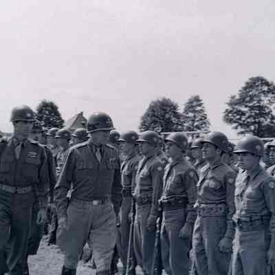 General George Patton reviewing the 45th Division with General Frederick