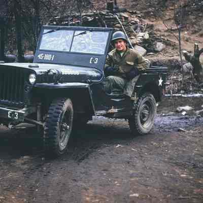 Soldier sitting in a Jeep