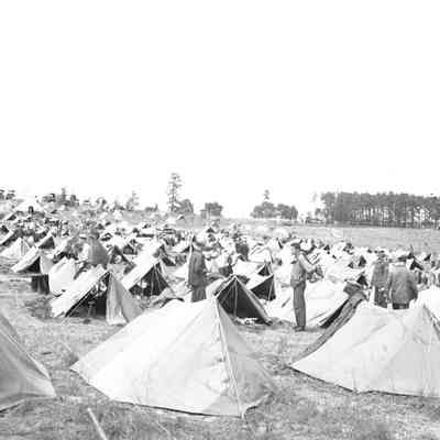 Soldiers in a pup tent encampment