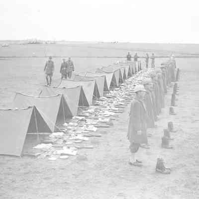 Soldiers standing field for equipment inspection