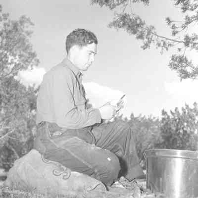 Soldier peeling potatoes