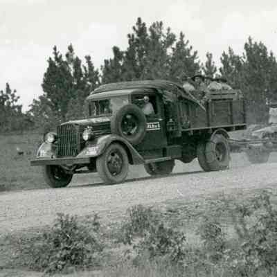 Truck pulling an artillery piece