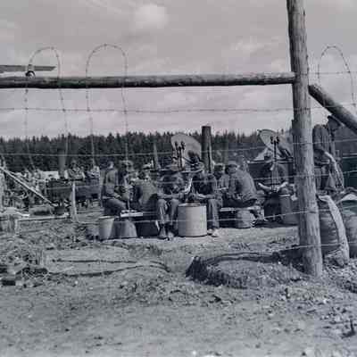 Prisoners of war helping cook
