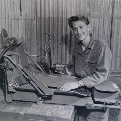 Air Force mechanic repairing aircraft components