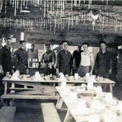Soldiers standing in a Mess hall