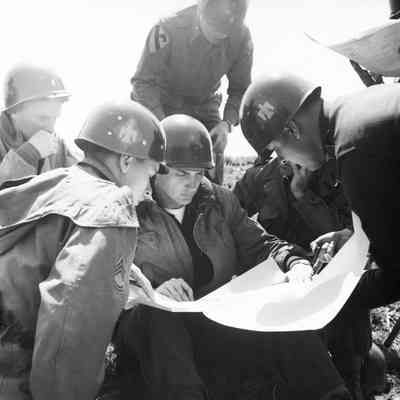 Soldiers reading a map