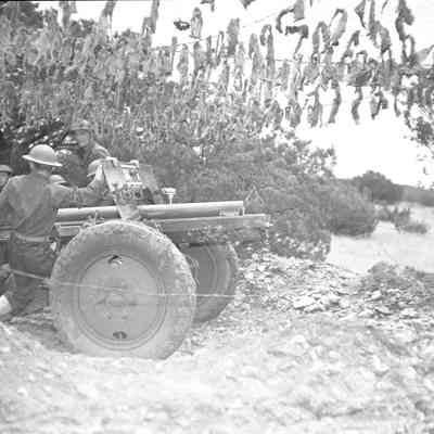 Artillery crew firing their piece
