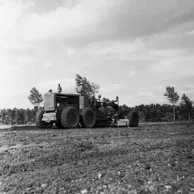 Army road grader at work