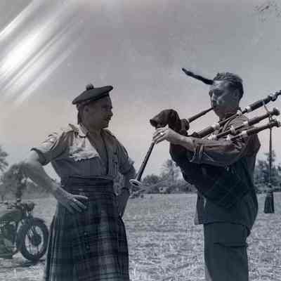 Soldier playing bagpipes