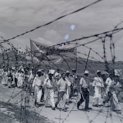 Japanese civilians parading with banners