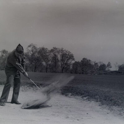 Soldier playing golf